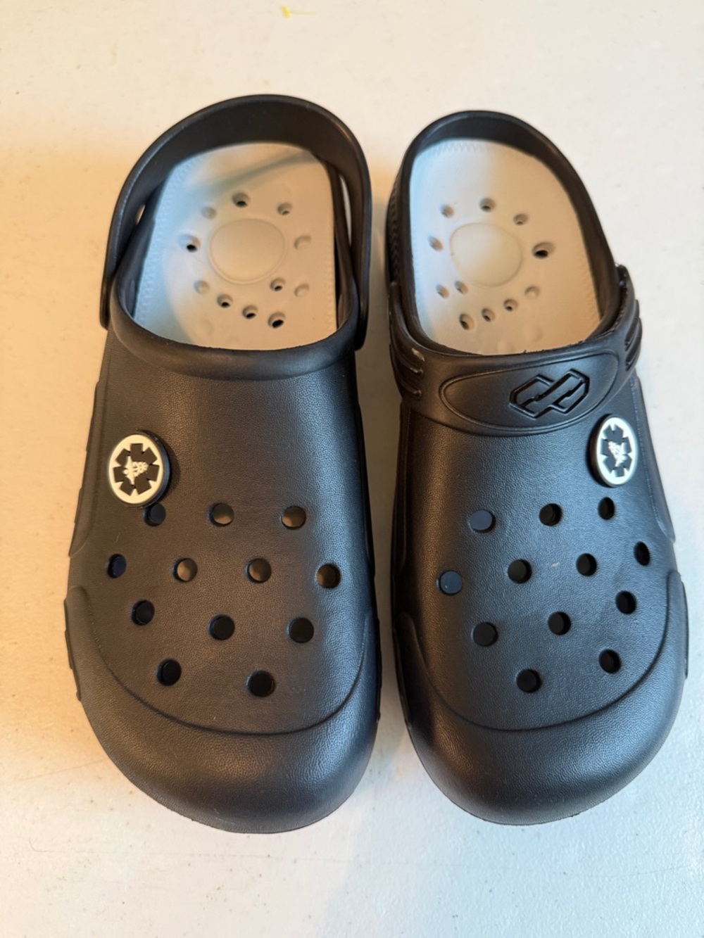 Black Ventilated Slip-On Clogs with Heel Strap